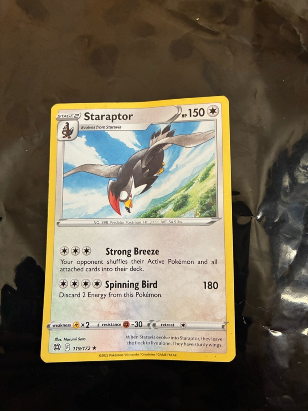 Pokemon Staraptor Card with Yellow Border and Blue Sky Artwork